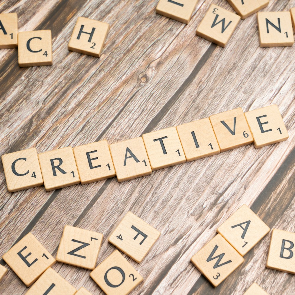 scrabble tiles spelling out the word creative